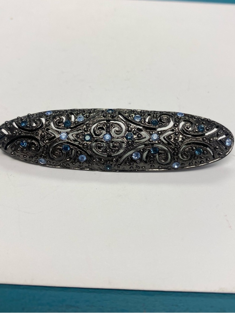 Decorative Gunmetal Brooch  with Blue Rhinestones